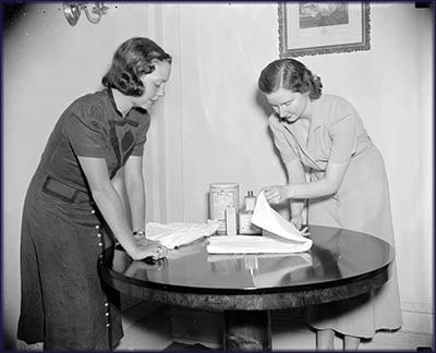 In the days before disposable diapers, cloth ones had to be folded like here from this 1937 photo. Harris & Ewing.