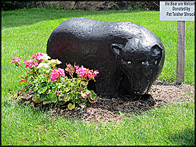 Victorian House Museum The Teisher family bear is in the house's lawn.