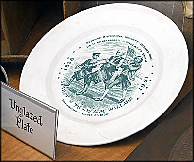 Unglazed plate created the Walker China Company with a copy of Archibald Willard's painting The Spirit of '76.